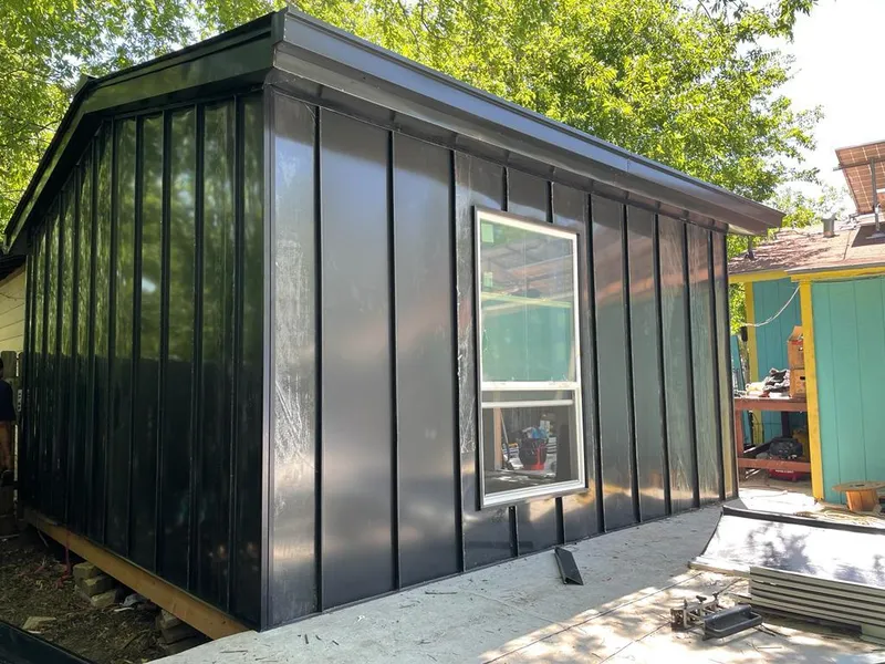 Black standing seam metal wall panels for Metal Roof Installation in Overland Park