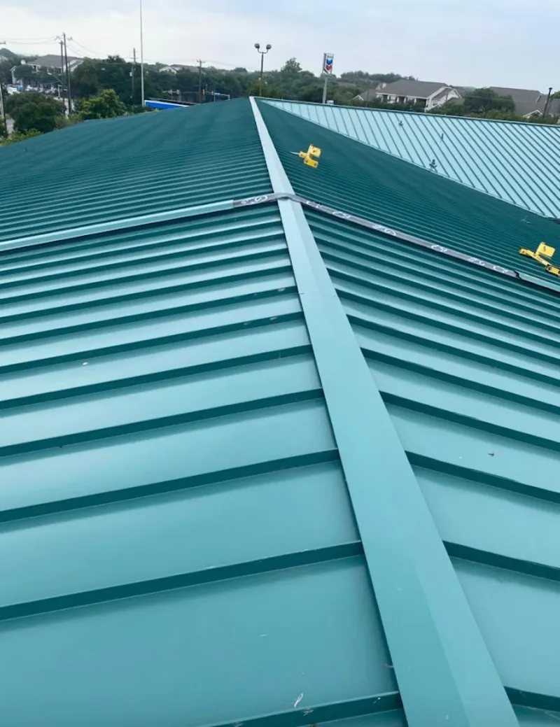 Green commercial metal roof ridge and valley for Metal Roof Repair in Overland Park