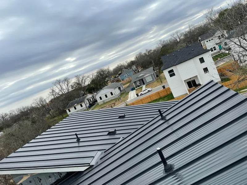Standing seam metal roof panels with vents for Skylight Repair in Overland Park